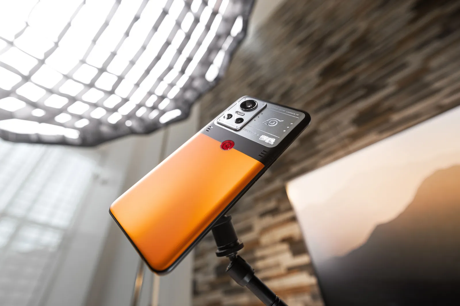 Close-up of a contemporary smartphone on a tripod with a modern background, showing advanced camera features