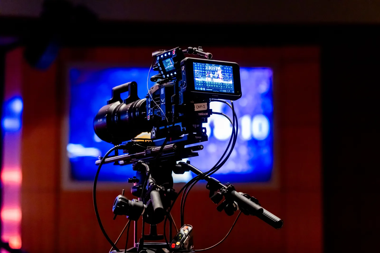 High-tech video camera setup in modern studio environment, showcasing professional equipment for filming